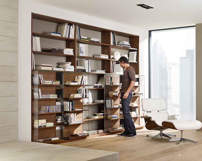 Cubus bookcase with a cabinet that slides in front