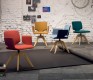 Red, yellow, blue and green examples of the high-end swivel dining chair - Aye