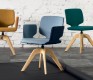 Superbly high-end swivel dining chair shown in yellow, blue and green
