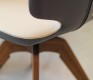 Detail of the two-tone leather from an Aye dining chair