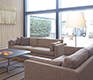 THE EJ 220 sofa from Erik Jorgensen shown in brown fabric