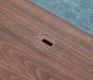 Close-up of the cable access hole on the Danish Modern desk