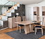 Extended v-shaped-legged oak dining table