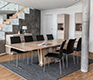 Extending v-shaped-legged oak dining table