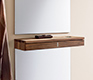 Hallway console drawer shown between two mirrors