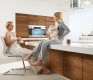 k7 height-adjustable kitchen bar set at a low eating position