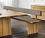 High-end oak dining bench with leather-upholstered seat padding and backrest