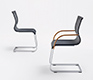 The Magnum cantilever dining chair and Magnum dining chair shown together