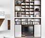 Luxury contemporary bookcases shown in walnut and white glass