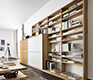 Luxury contemporary wall units shown in oak and white glass fronts