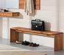 Luxury hall bench from Team7 shown in solid walnut