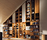 Luxury wall system with sliding glass-fronted shelves