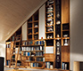 High-end luxury wall system with sliding glass-enclosed shelving unit