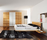 Modern solid hardwood bed that appears to float on its frame