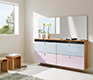 Modern hallway cabinets shown with two-tone glass fronts and solid hardwood