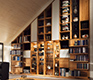 Modern luxury bookcases shown in oak and glass