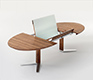 Extending oval dining table