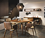 Extremely beautiful round dining room table in solid walnut and leather