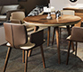Gorgeous high-end luxurious dining room table in solid walnut wood and leather