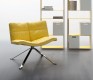 The 901 living room designer armchair with steel spider legs
