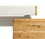 Top detail view of the Nox wood dining table and leather-padded bench - both shown in oak