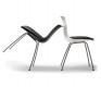 Steel-legged moulded bucket dining chair shown in black and in white