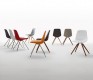 Bucket-seated dining chairs in white, grey, black, orange, light blue, taupe and red