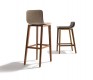Team7 Ark bar stools shown in leather and walnut
