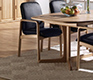 Traditional Danish carver dining chair with leather upholstery in black