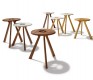 A number of treeO coffee tables shown in different sizes, woods and tops