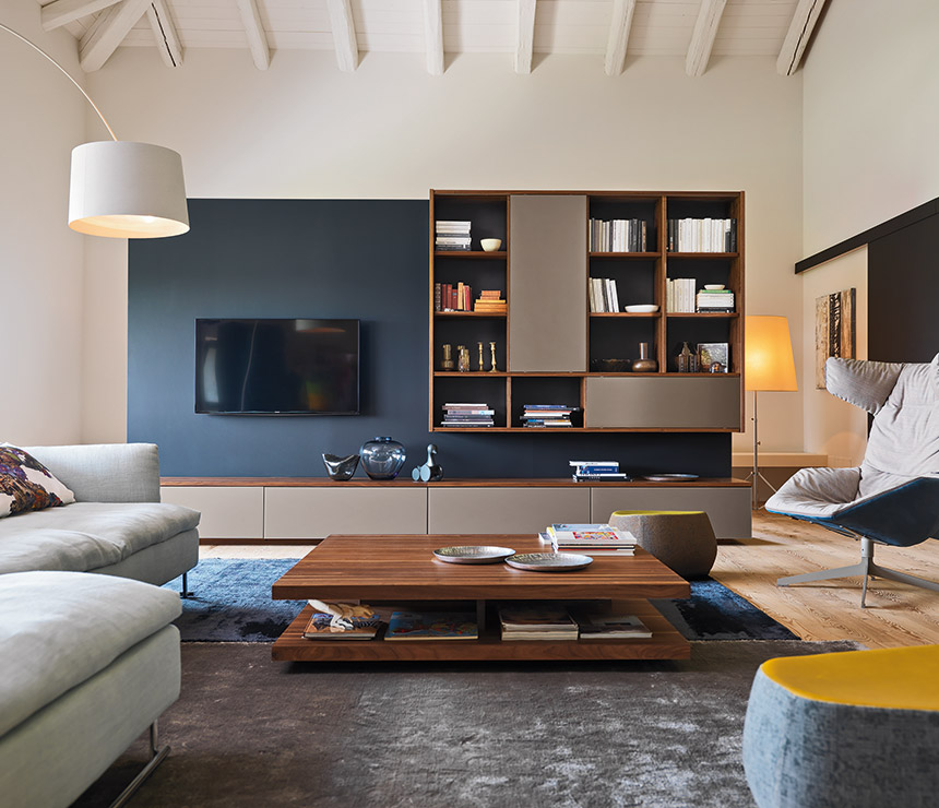 High-end solid walnut coffee table shown in a room-set