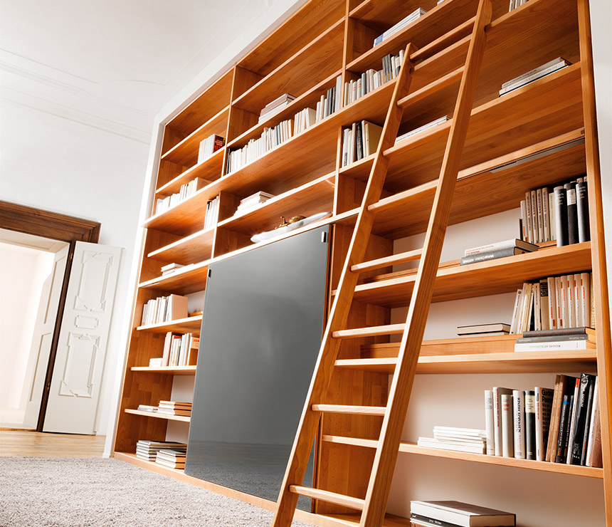 Contemporary luxury bookcases shown in beech