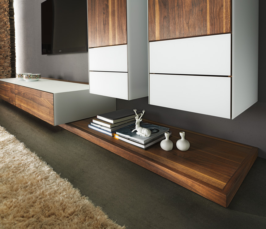 Cubus Pure media cabinets shown in walnut and white glass