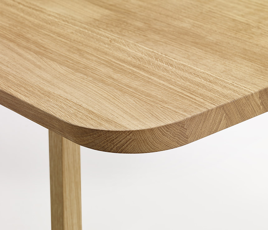 Close-up view of the Danish dining room table in solid oak wood