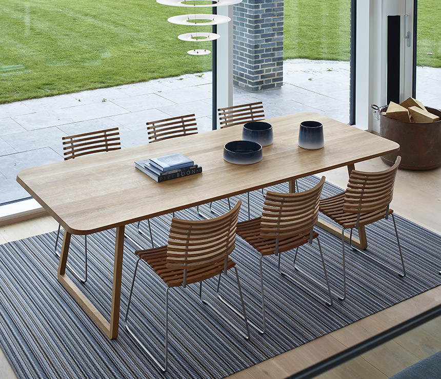 Danish solid wood rectangular dining table shown in oak