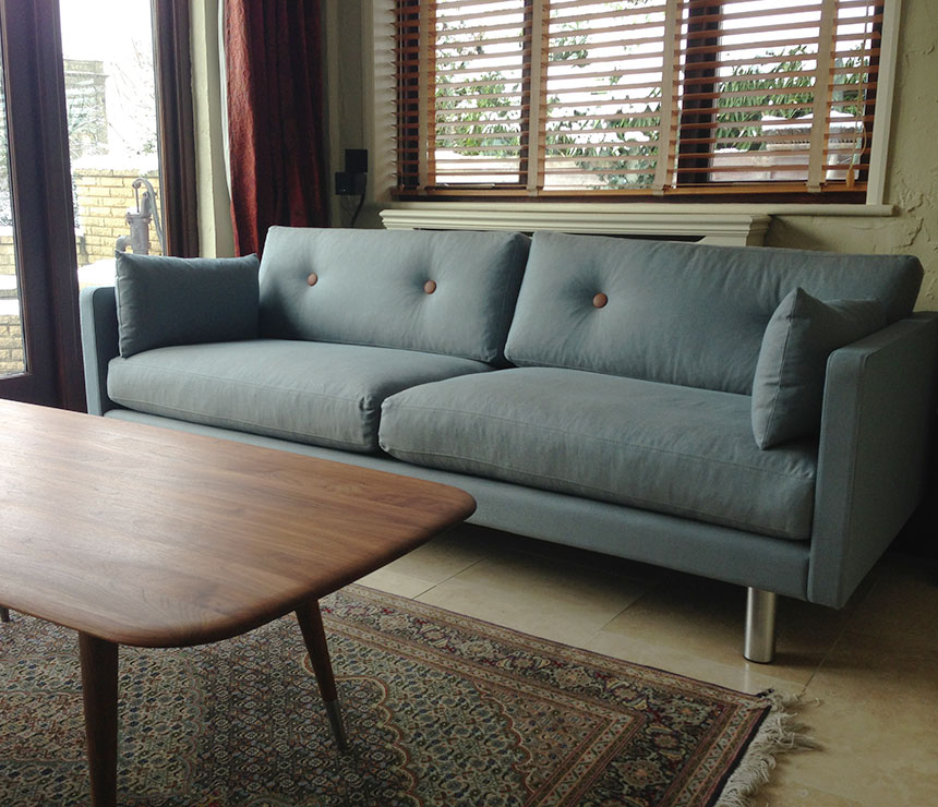 Green fabric Erik Jorgensen sofa