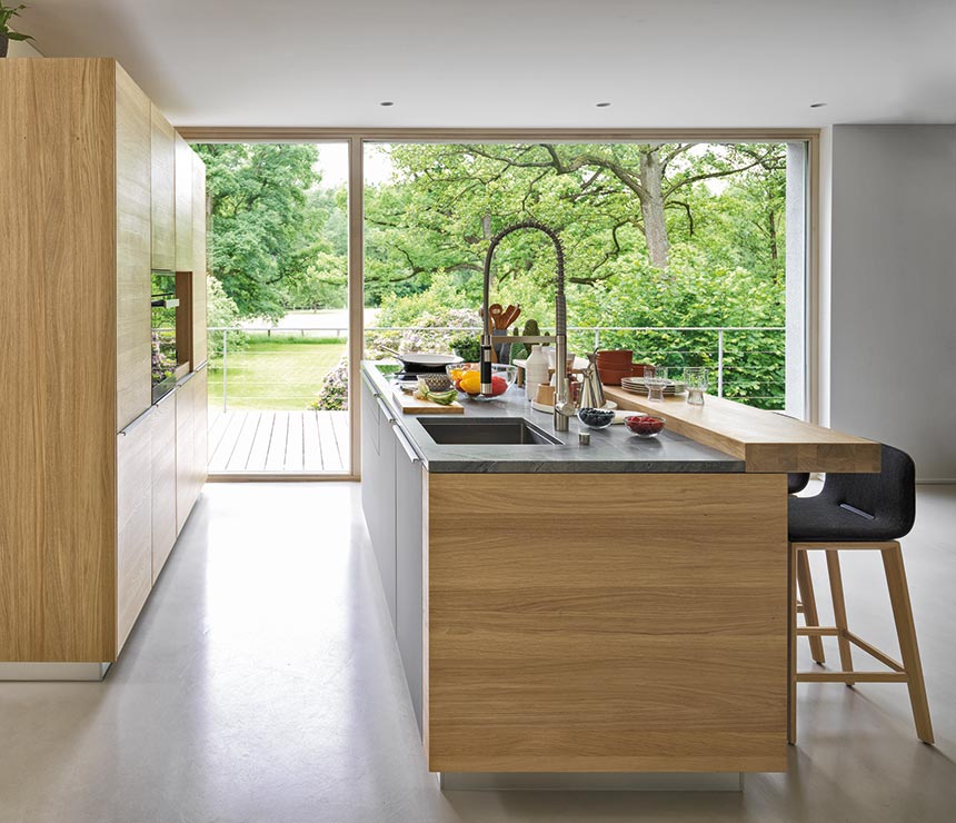 Side-on view of the Linee Kitchen in room