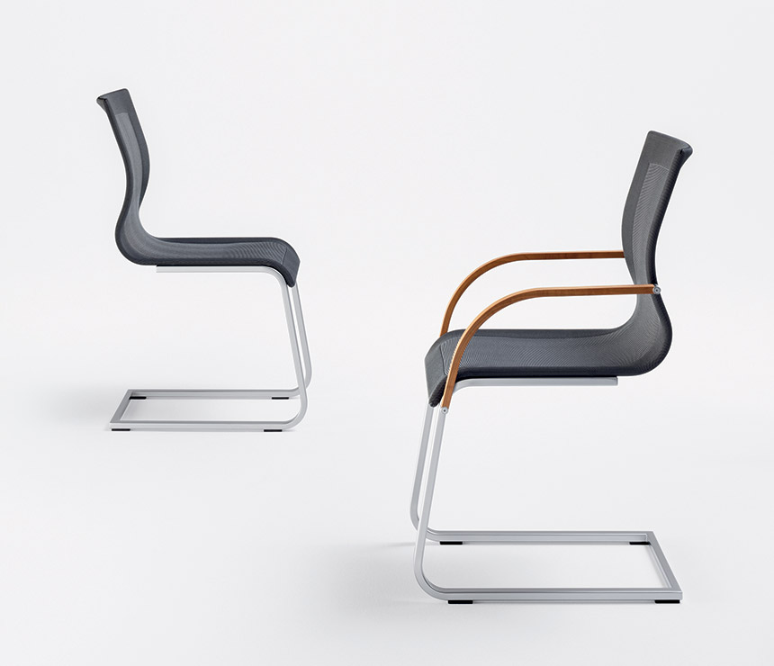 The Magnum cantilever dining chair and Magnum dining chair shown together