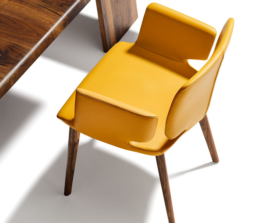 High-end luxury leather-upholstered carver dining chair