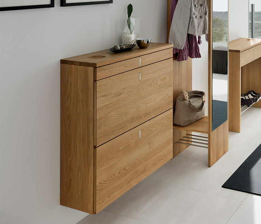 Luxury modern shoe chest shown in solid oak