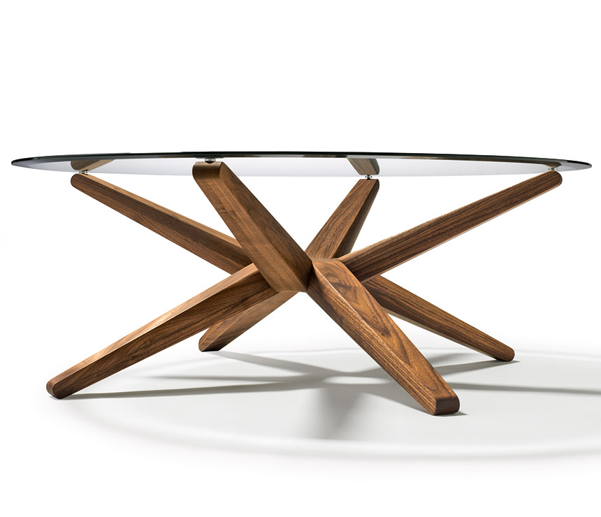 Round luxury glass coffee table shown from the side