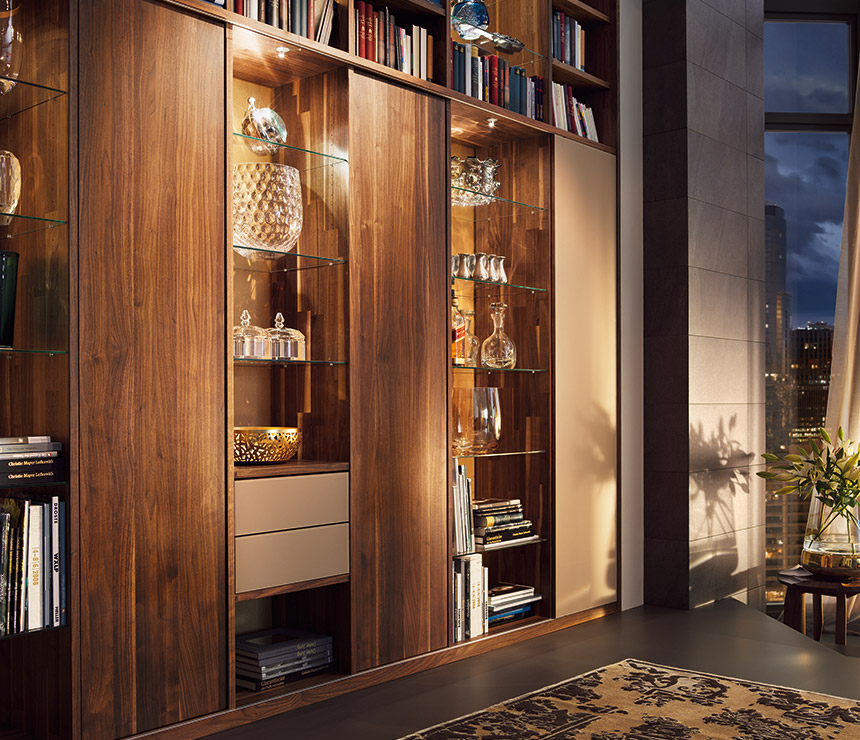 Luxury walnut wall units shown with sliding panels