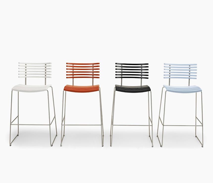 Coloured examples of the DM4167 high-end Danish bar stool in white, pastel blue, orange and black
