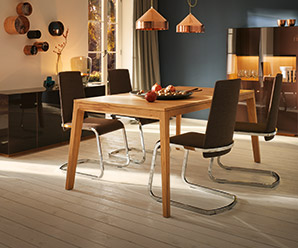 Outwardly tapered legs allow for more chairs to be seated in a smaller space