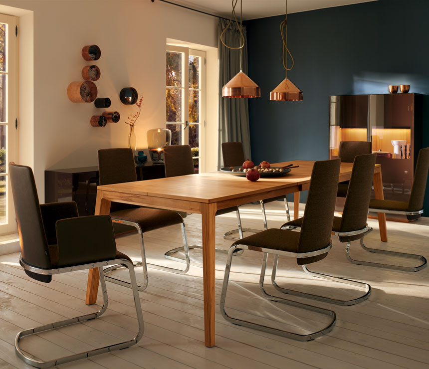 Extended example of the Mylon dining table with tapered legs for increased 8 people seating capacity