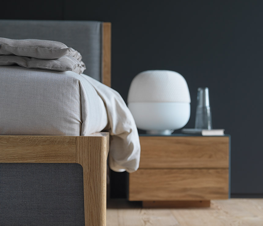 Close-up of Mylon solid wood and upholstered bed in blue