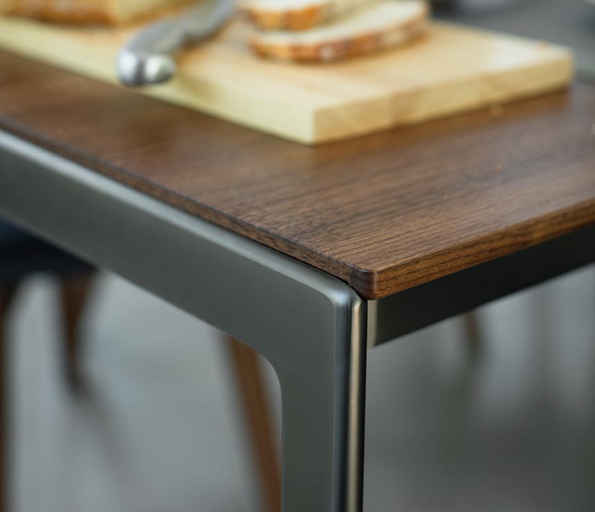 Close up of the super slim Tak dining table