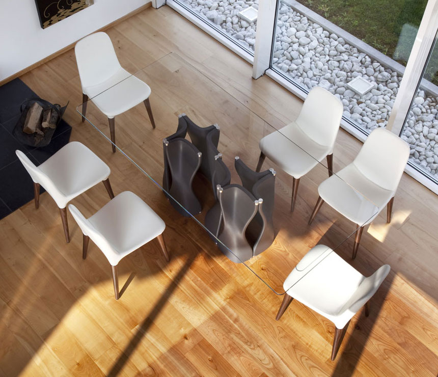 The 217 rectangle glass dining table shown with black pedestal bases