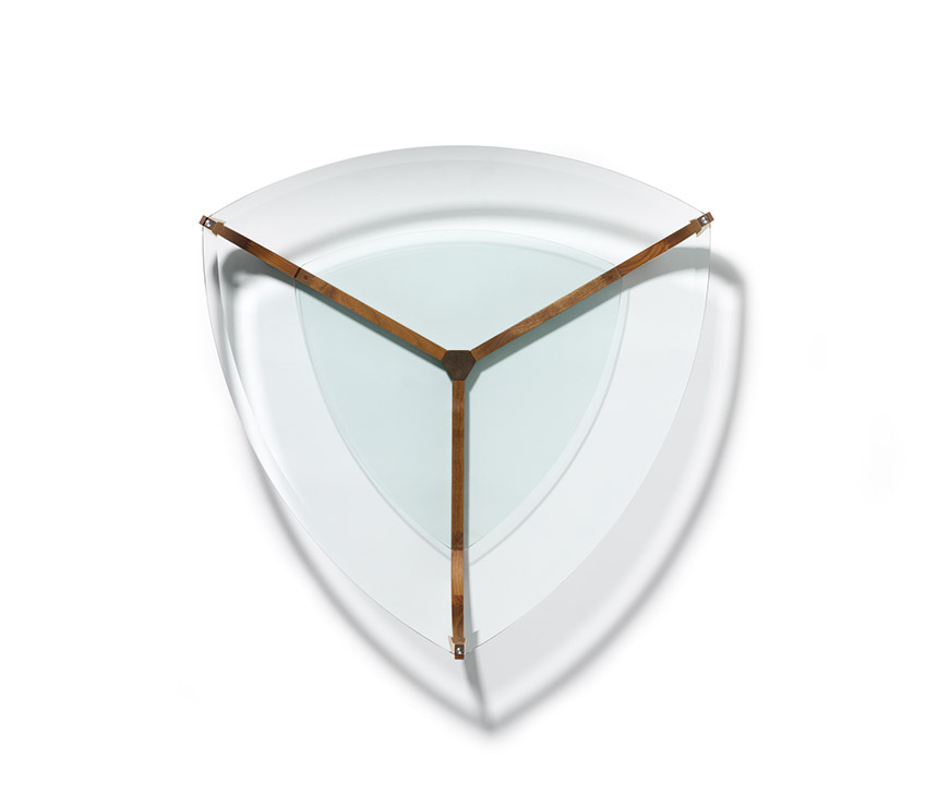 Triangular glass-topped coffee table