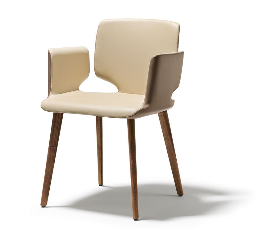 High-end Aye carver dining chair shown in two-tone leather hide